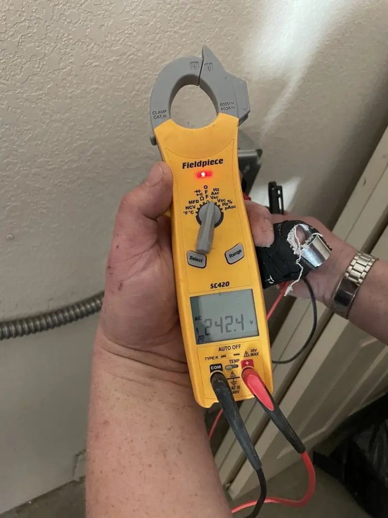 Voltage testing with clamp meter during Circuit Breaker Repair in Bridgewater Town
